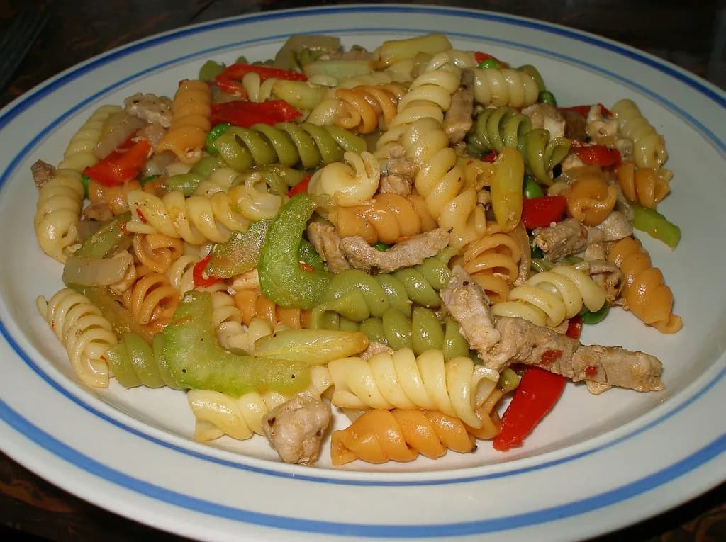 Pasta served with vegetables and chicken