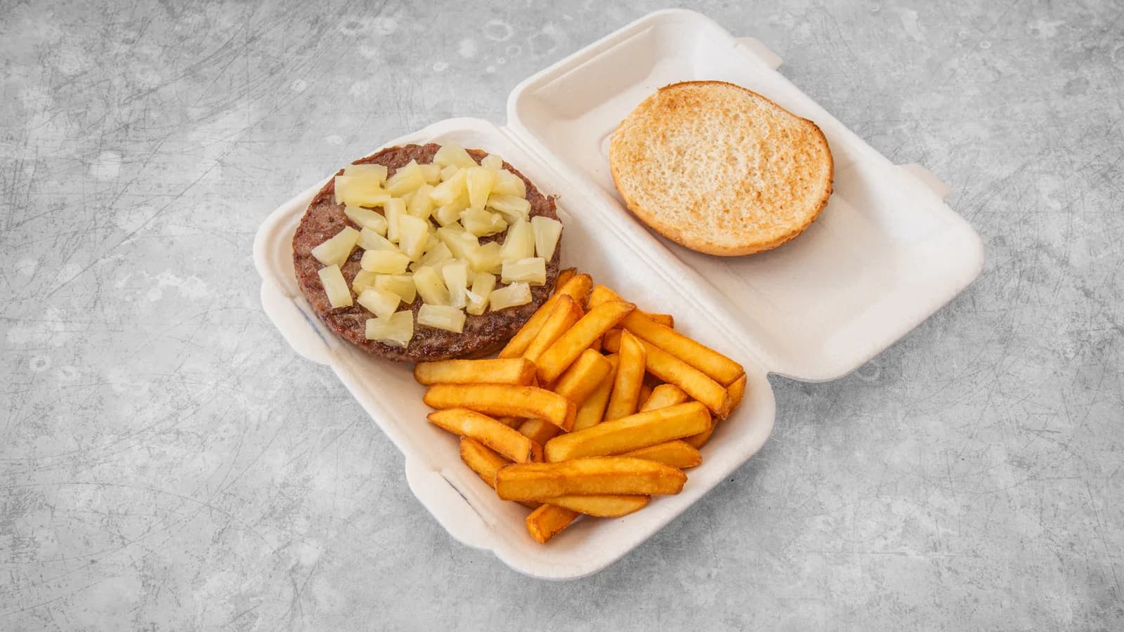 Hawaiian Burger Topped with Pineapple from Pizza Nova